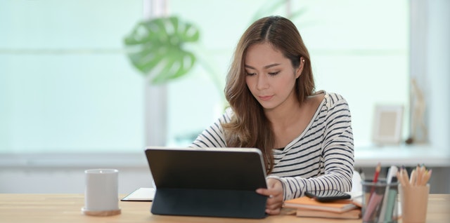 woman using tablet