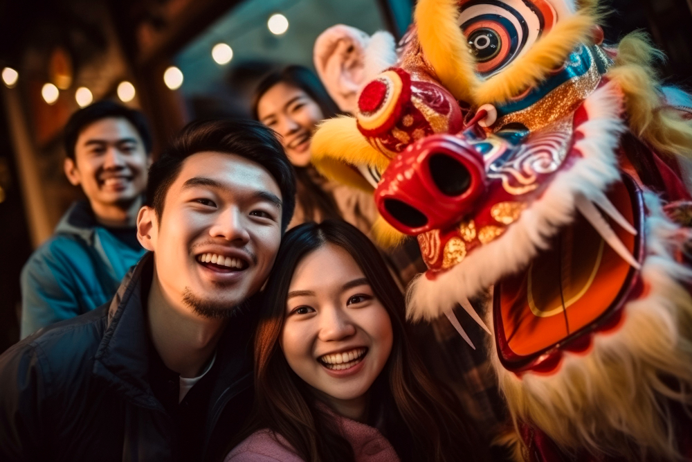 A group of people taking picture with the Lion Dance Head 
